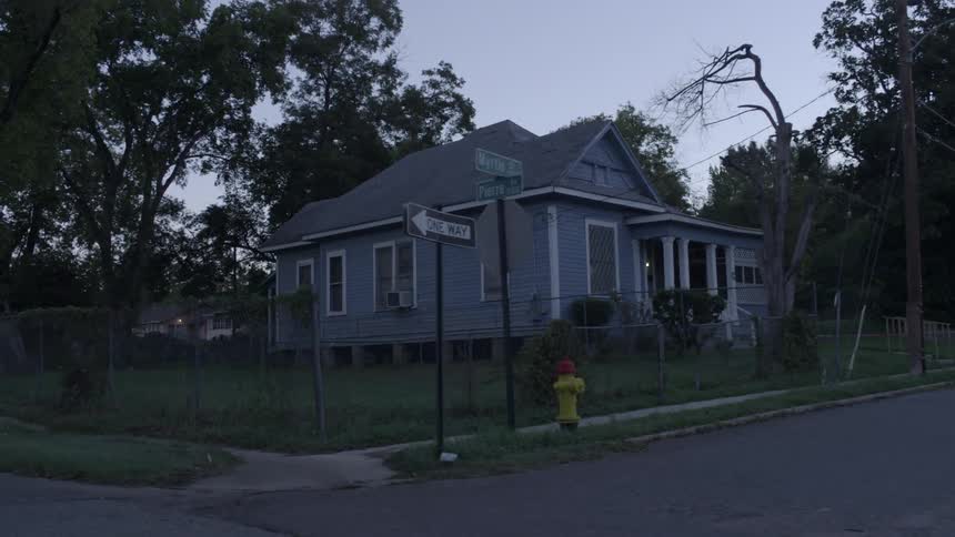 A house sits on a corner lot