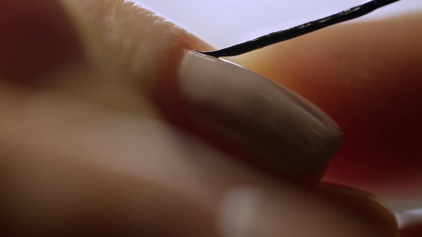 Finger nails being painted