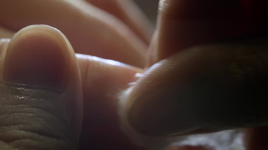 Someone getting their nails cleaned