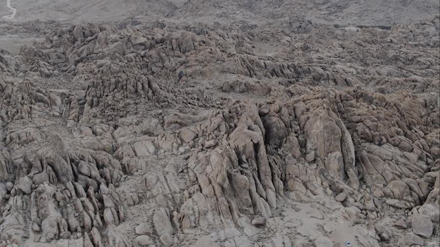 The mountains are high and gray in color