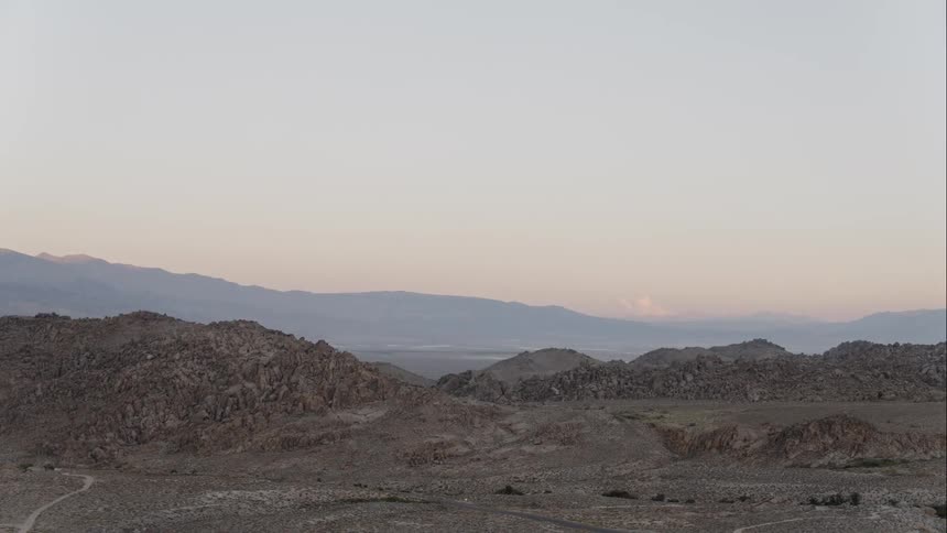 Dirt roads weave through the desert