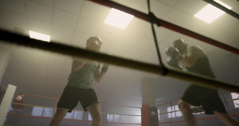 Two men are boxing