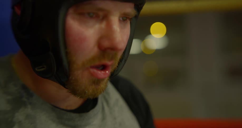 Man drinks water after exercising hard