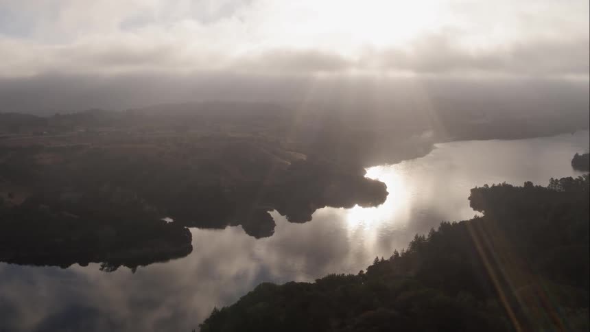 Water showcases the cloudy sky
