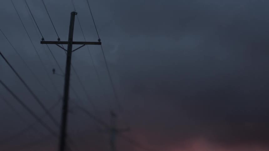 Power lines tower overhead