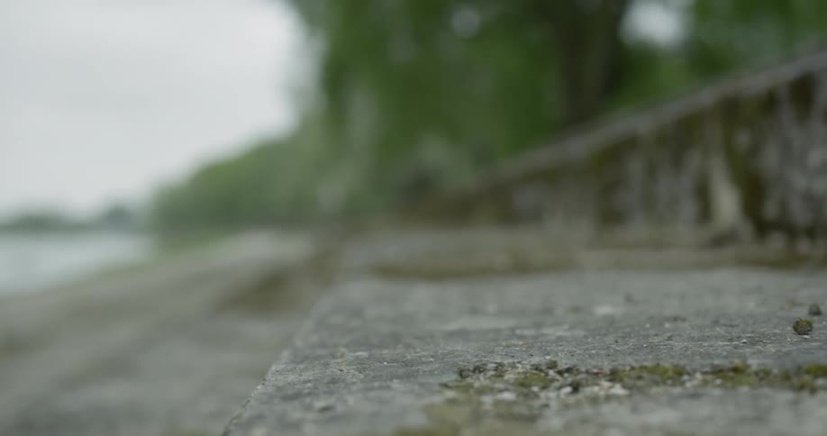 Man runs up and down the stairs on a cloudy day