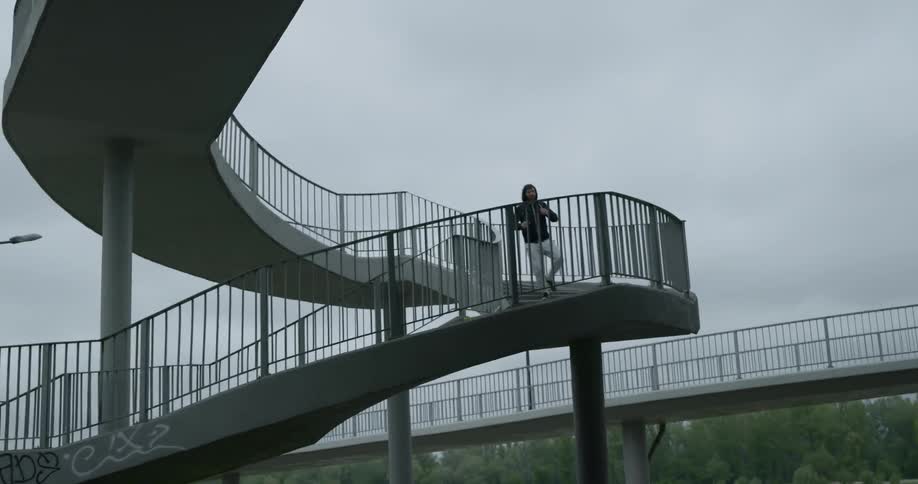 A man runs down the foot path