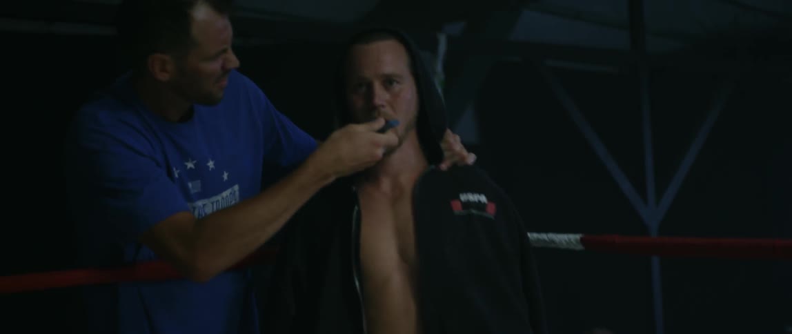 Boxer getting hyped by his coach