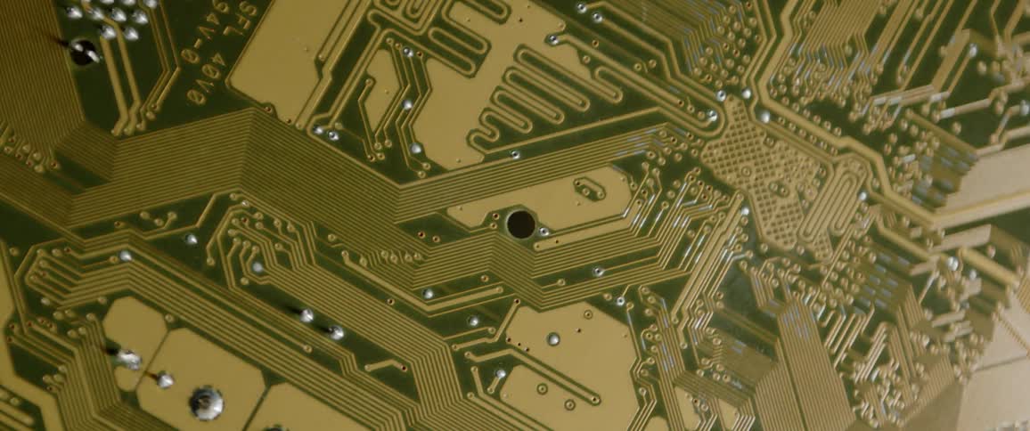 Static shot of a circuit board with roving lighting