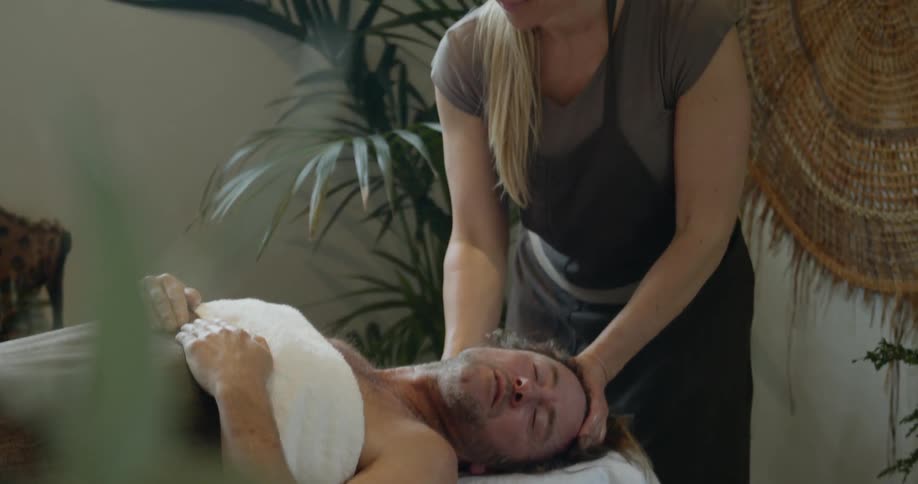 A man enjoys a professional massage