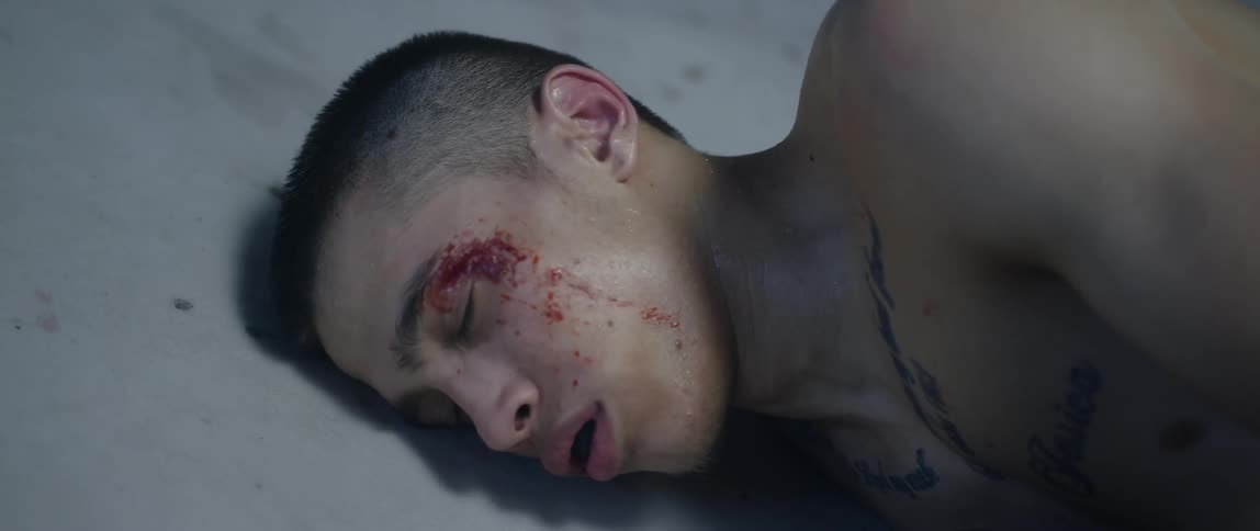 A boxer falling down on the mat