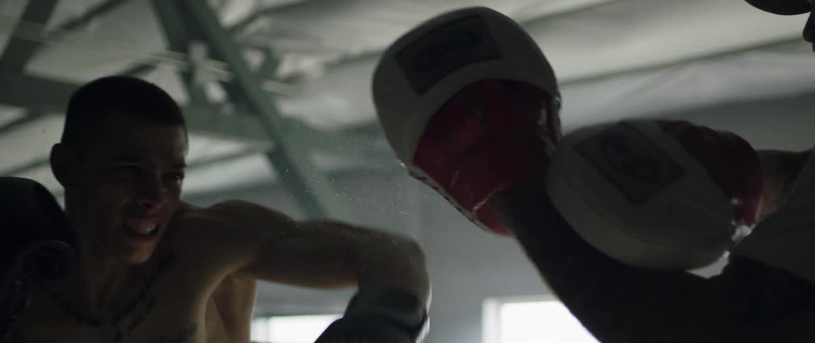 Two men sparring in a ring