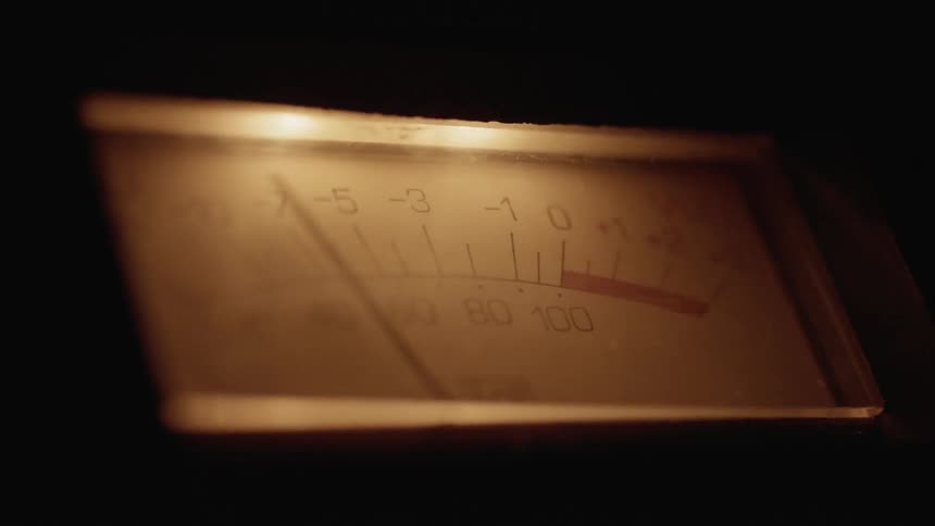 The needle of a lighted meter jumps back and forth