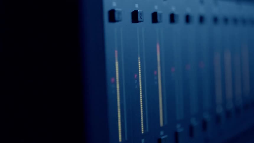 An equalizer with volume control lights moving up and down as a background light flashes on and off