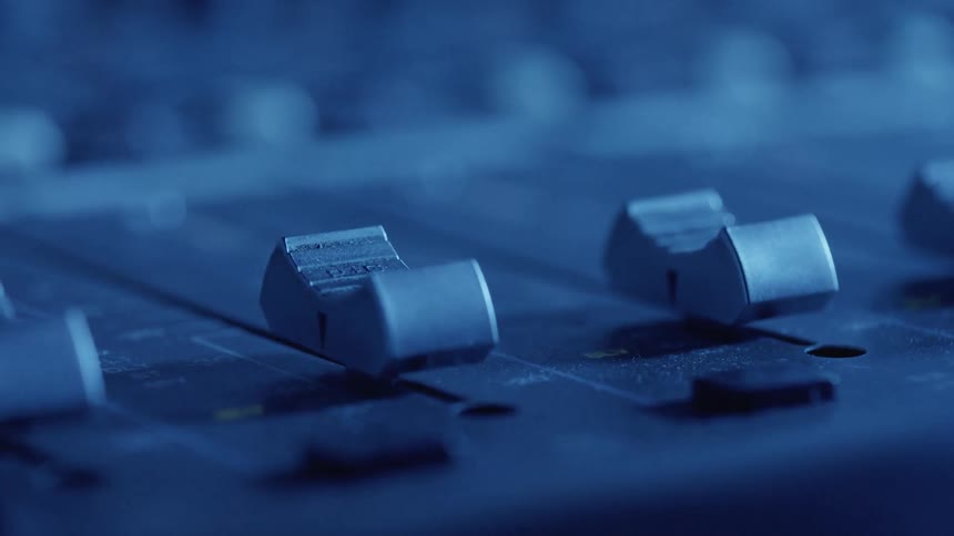 Knobs on a computer device sliding up and down in automated fashion
