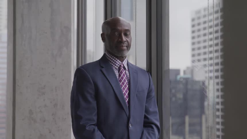 A businessman posing for a portrait