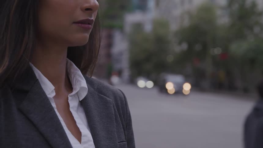 Female worker stand on the sidewalks