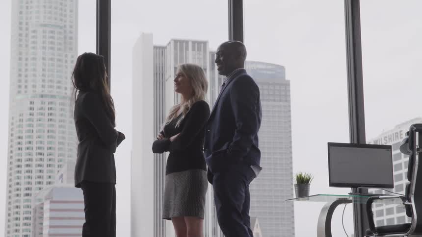 People are talking together in the office