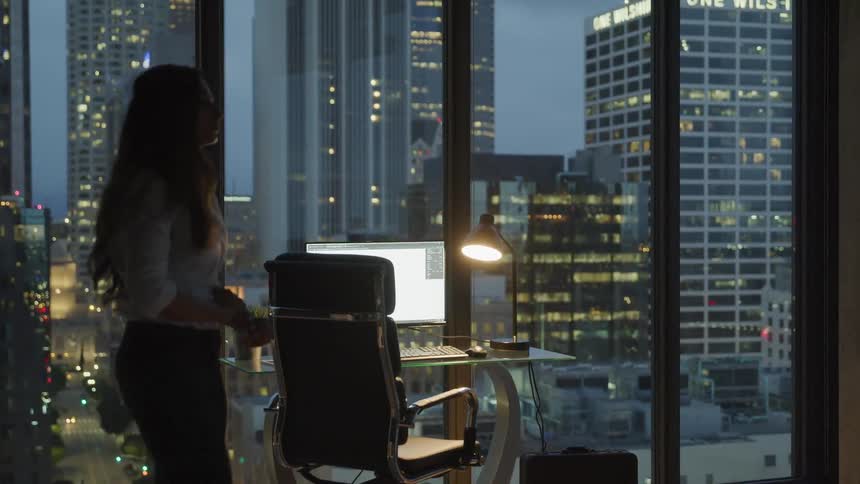A female worker thinking in the office
