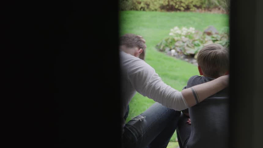 Brother talks in the courtyard