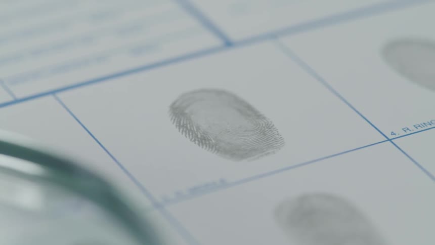 Fingerprints are displayed on a paper