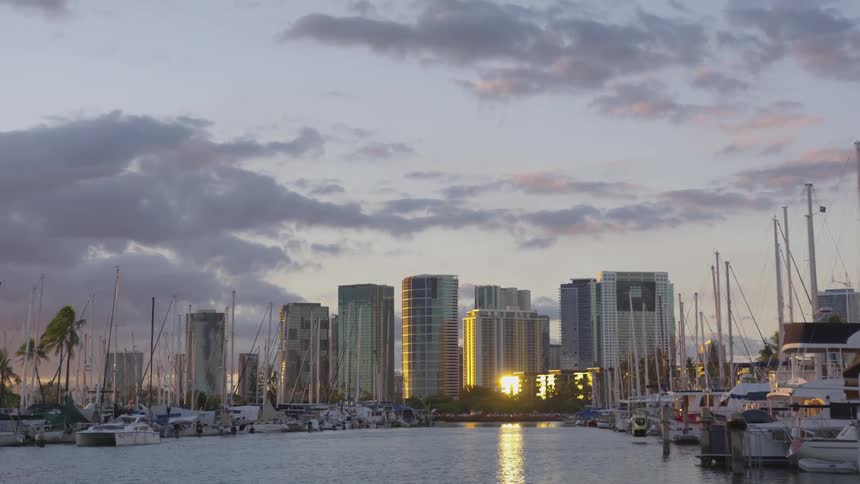 A port with boats with buildings in the background