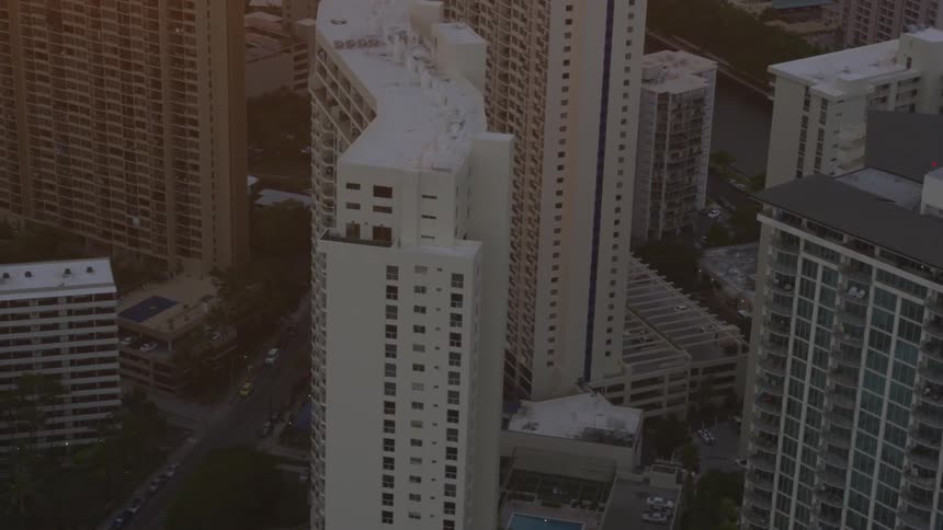 An aerial view of a downtown city is displayed