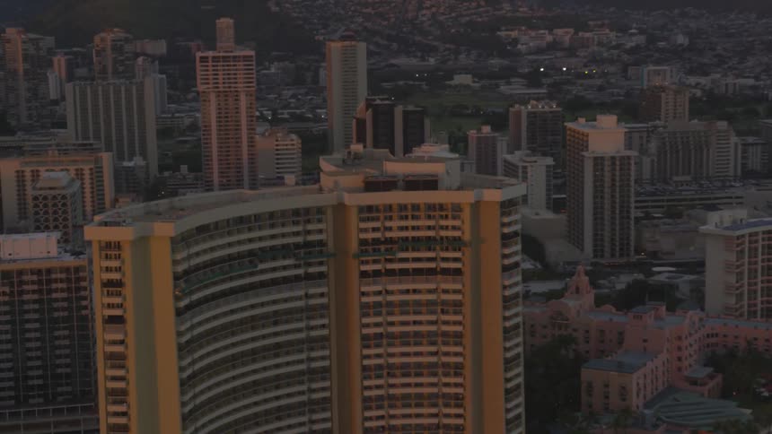 An aerial view of a downtown city is displayed