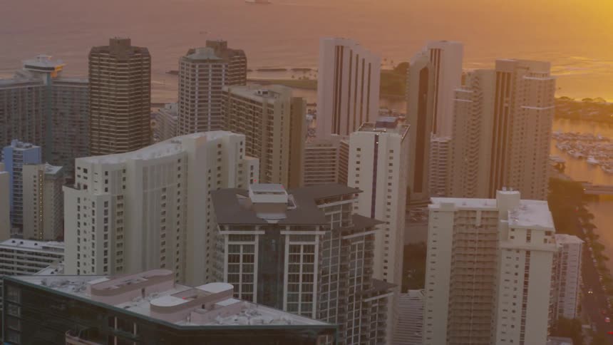 Skyscrapers in a metropolis at sunset