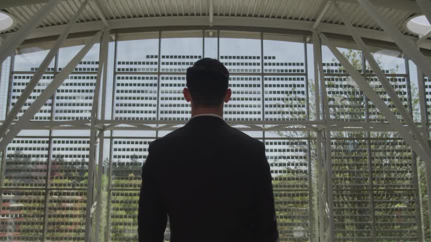 A man stares at the window