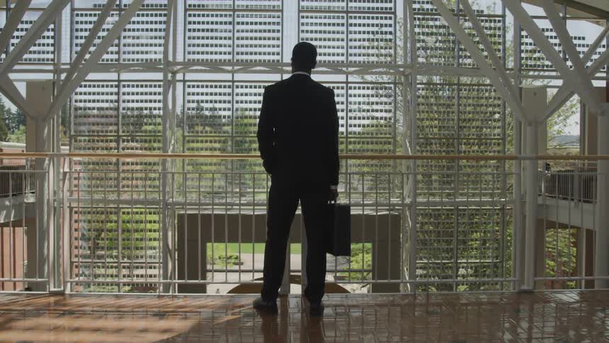 A man is waiting on the platform