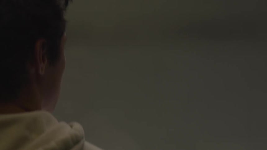 A man rides an elevator going up