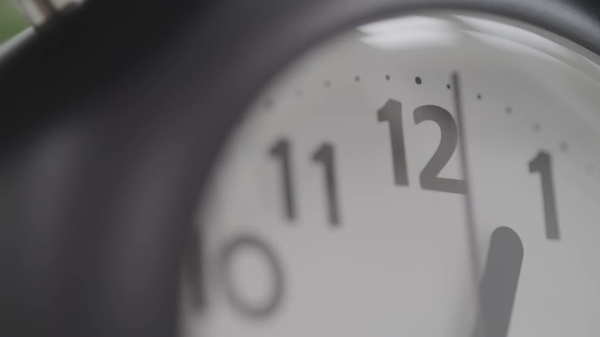 The second hand turns on a clock face