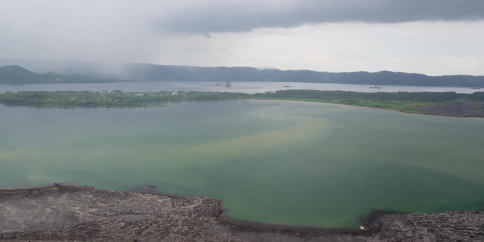 A still lake on a cloudy day
