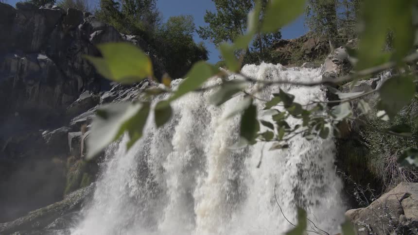 A water fall crashes down