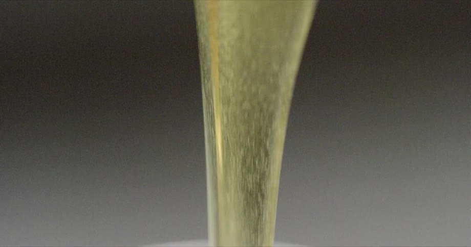 Liquid is being poured into a cup