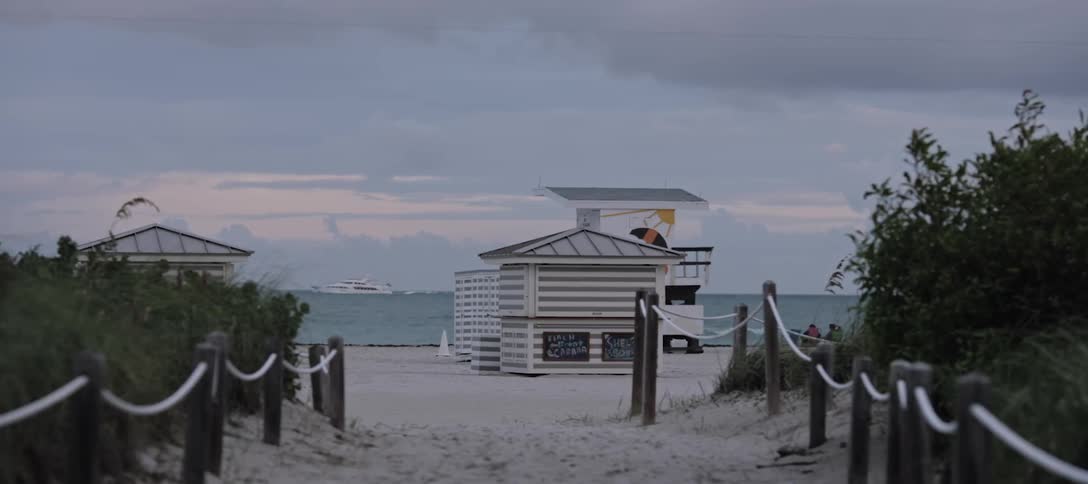 Buildings sit on a beach