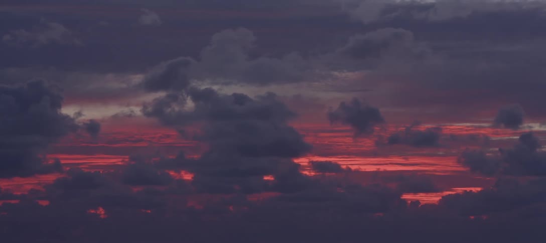 Landscape view of a red sky and clouds