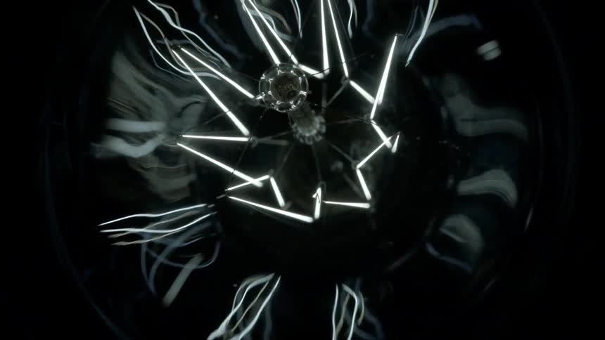 Electronic circular device with wires and glowing filaments