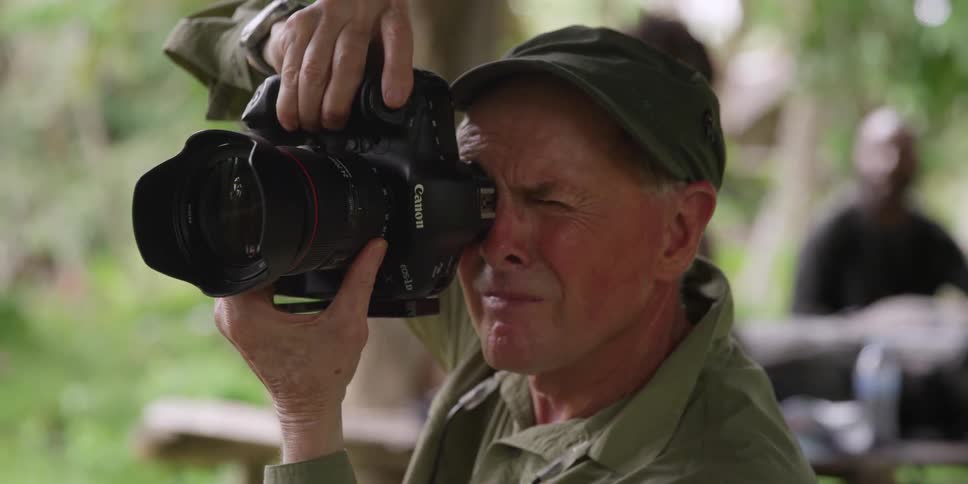 A person taking pictures with a camera