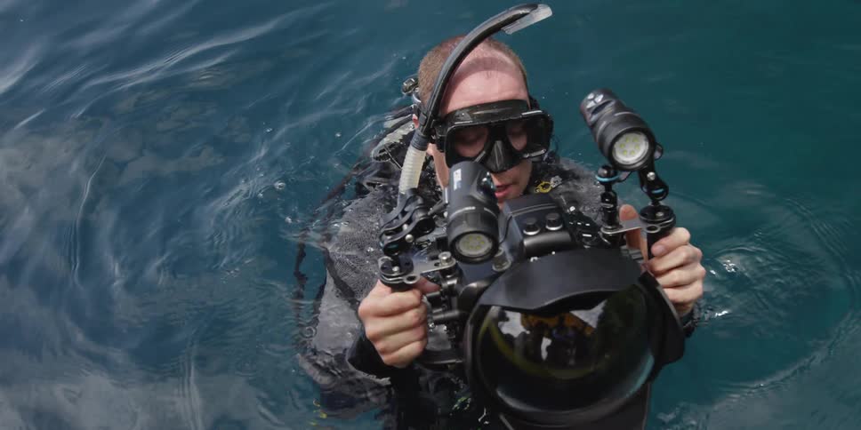 A diver using a camera
