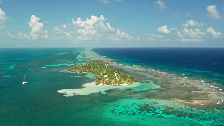 An island with a boat in the water