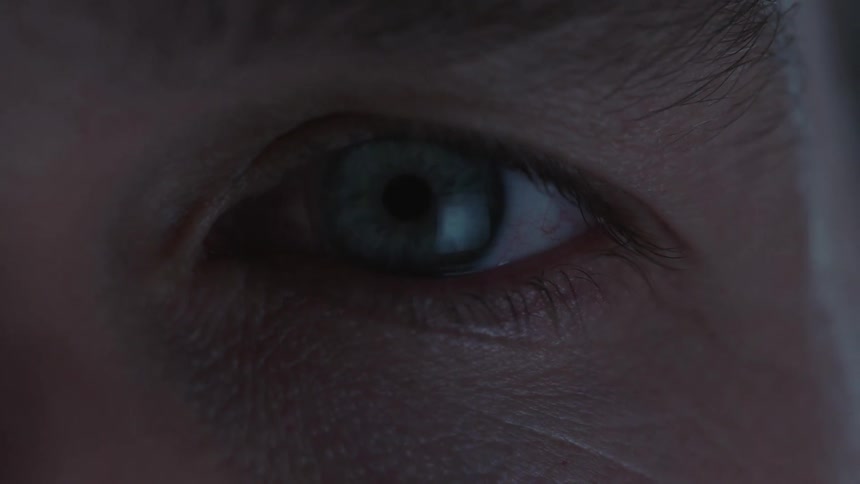 Pupil of blue eye expands when person opens eye