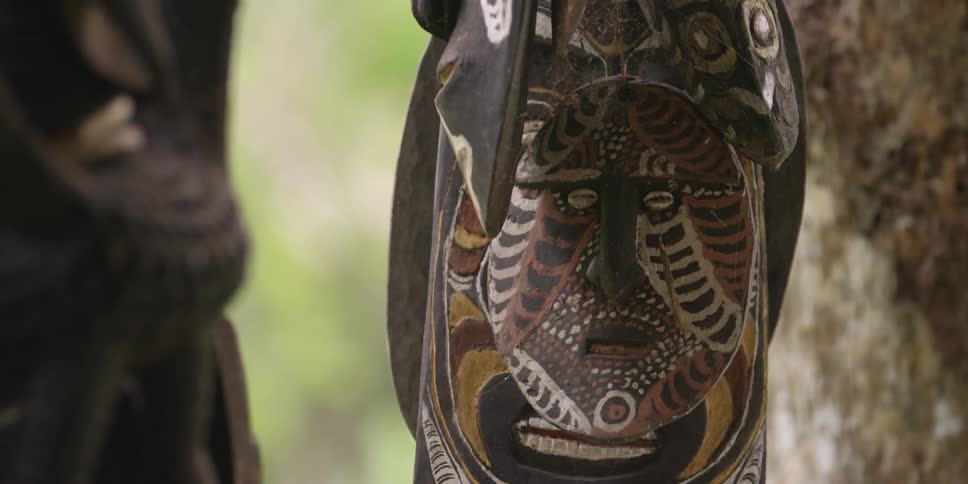African masks hanging outside