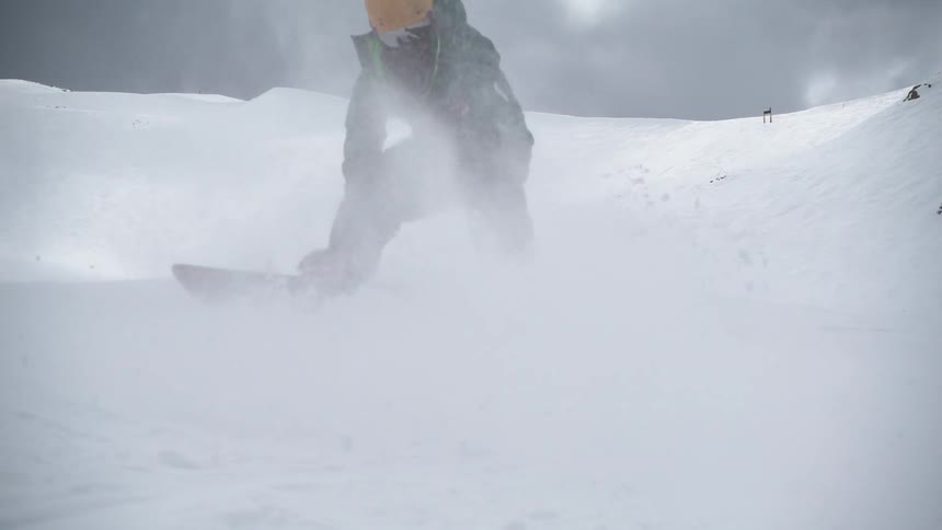 A person is snowboarding