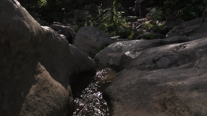 A small stream cuts through some rocks