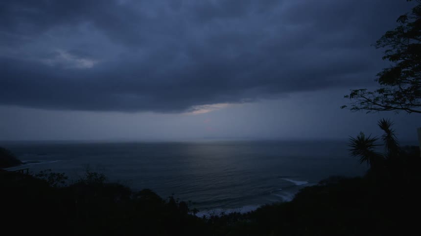 A time lapse scenery of a beach on the night