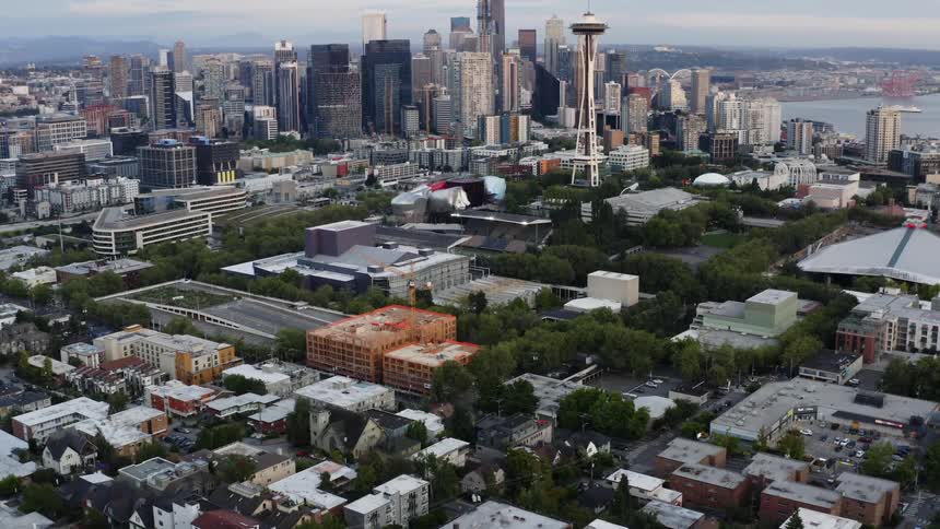 An aerial view of a futuristic city skyline