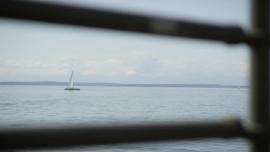 A small boat is sailing in the water