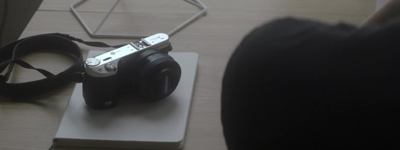 A camera sitting on a table